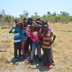 Kids from the stuck bus we came across. The wheels were spinning in the sand stranding the school kids. The teachers asked if we had water to spare. I thought "really, you brought a group of kids into the Kalahari without ample water?!" Ahhh, such is Africa!