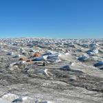 Our camp in the background, complete with toilet tent!