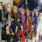 No requirement as to the color or design of the headscarf women must wear.  Pretty much anything will do!
