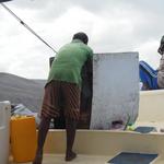 The chef cooking on the boat.