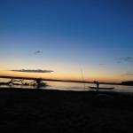 View of the pirogue against the sunset as seen from my tent.