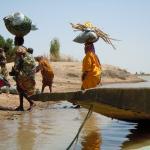 Traditional way women carry their load.