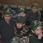 School in the Kalasha Valley. All boys wear a Pakistan hat!