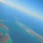 Reentering Earth's atmosphere.   (Actually, arriving in Port Moresby, the capital)