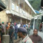 Waiting for a PMV to Goroka.  Tons of men standing around with nothing to do, never a good sign.  Idol hands......
