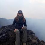 Sitting on the crater's edge with seriously wind blown hair.  The wind was, at times, gale force at the top!