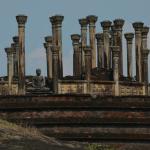 Medirigiriya Vihara; a circular relic house consisting of a small central dagoba (Buddhist monument) flanked by Buddhha images and encircled by columns.