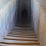 Going down to a well-preserved tomb at El Kurru.