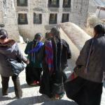 Tibetan women wear their hair in 108 braids, an auspicious number in Buddhism.  
