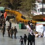 Armed Chinese soldiers with riot gear are everywhere in the old town.