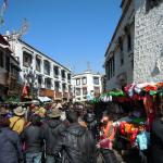 Joining the Barkhor Circuit circling Jokhang Temple.