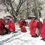 Monks getting ready to debate.
