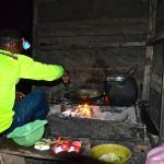 My porter cooking dinner.