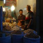 Selling goods at the market.