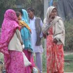 Indian women in their colorful saris.