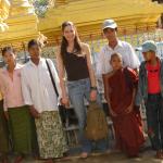 In Mandalay with a group wanting my picture.  Why she held my hand, I do not know!