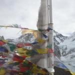 Prayer flags flapping in the bitter wind.