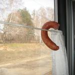 A fine place for a sausage in the train cabin.
