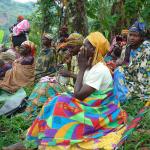Locals having a meeting.  The men were all on the other side but their clothing was drab by comparison.